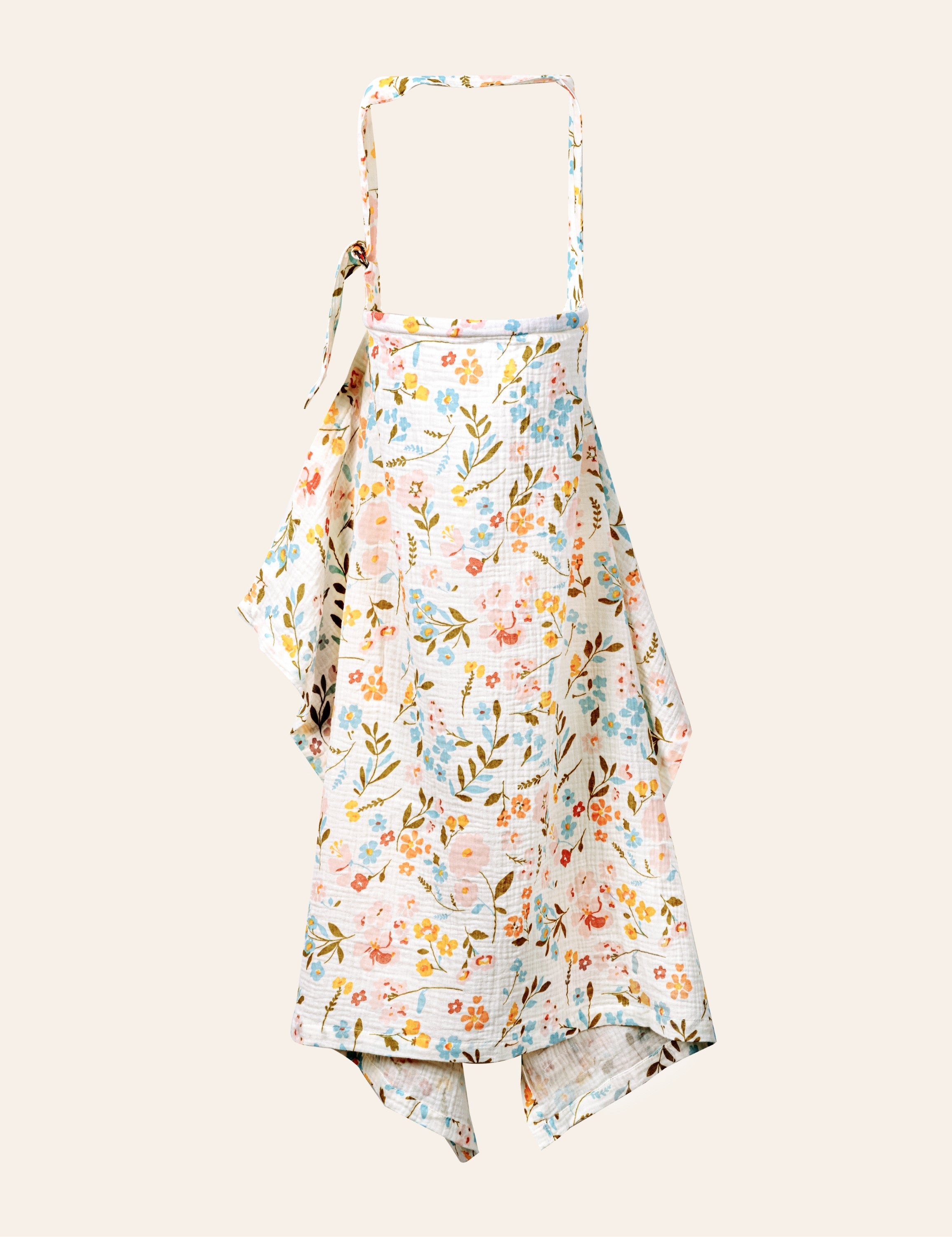 Floral-patterned muslin nursing cover on a white background