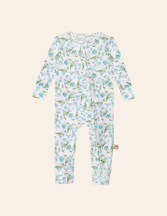 Botanical patterned baby sleeper on a beige background