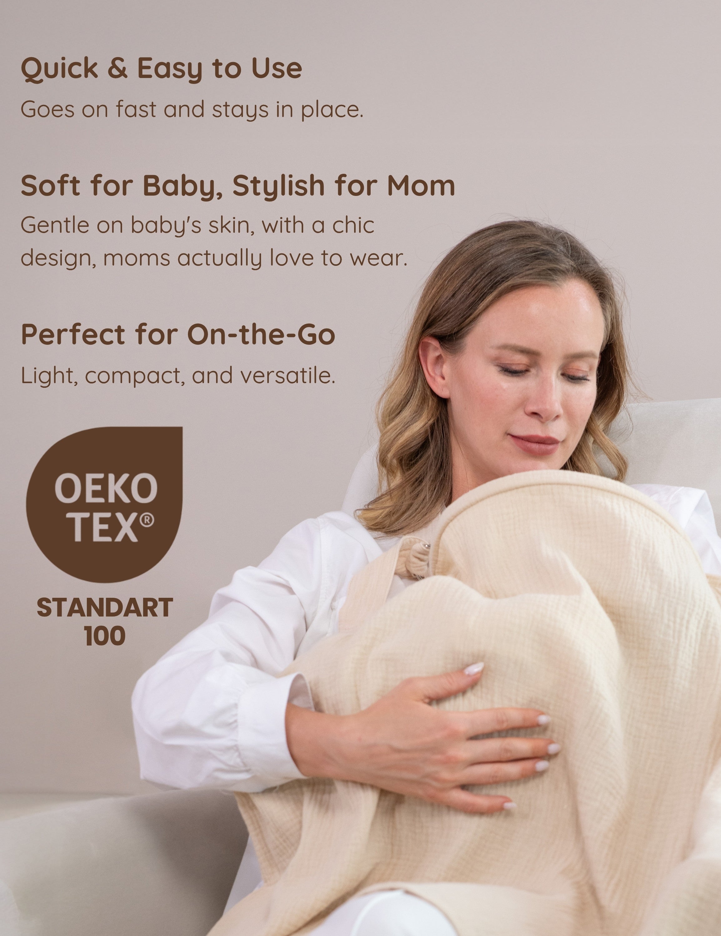 A mother wearing muslin nursing cover holding and nursing her baby