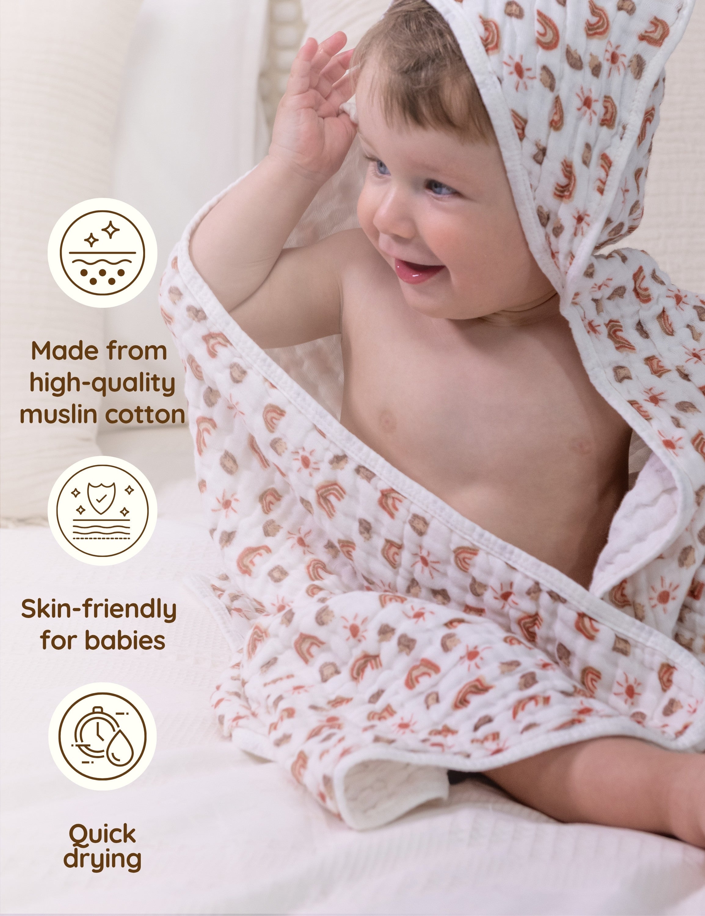 Baby wrapped in a high-quality rainbow patterned muslin cotton towel with text highlighting its features.