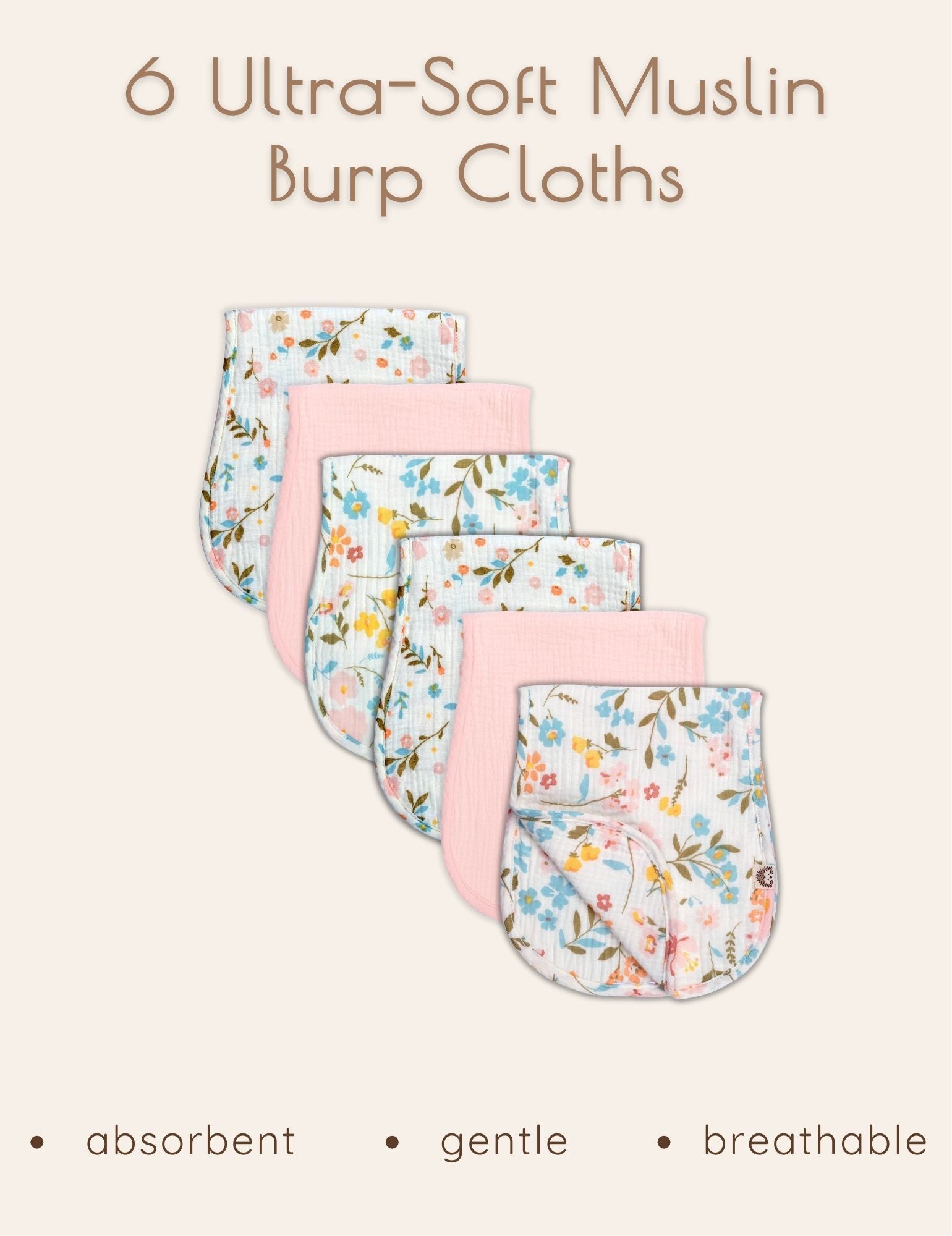 Set of six ultra-soft muslin burp cloths with floral patterns and solid pink colored patterns displayed together