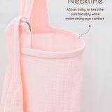 Solid pink muslin nursing cover with text explaining the boned neckline design on a light gray background