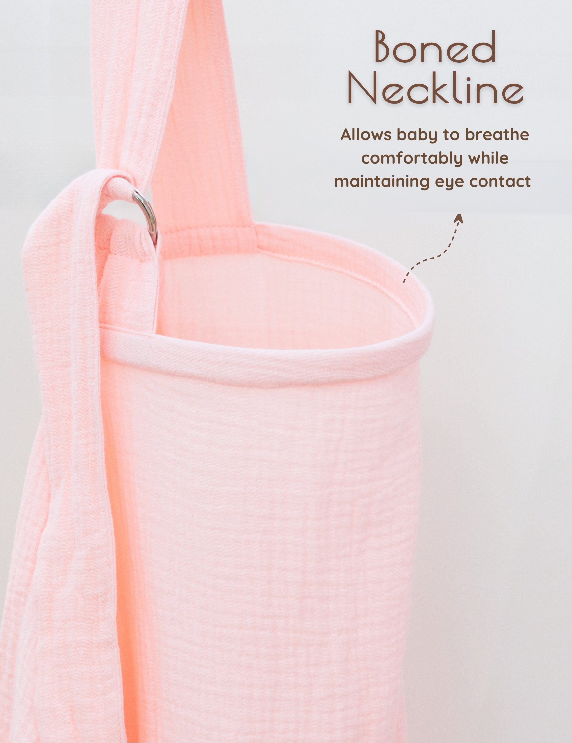 Solid pink muslin nursing cover with text explaining the boned neckline design on a light gray background