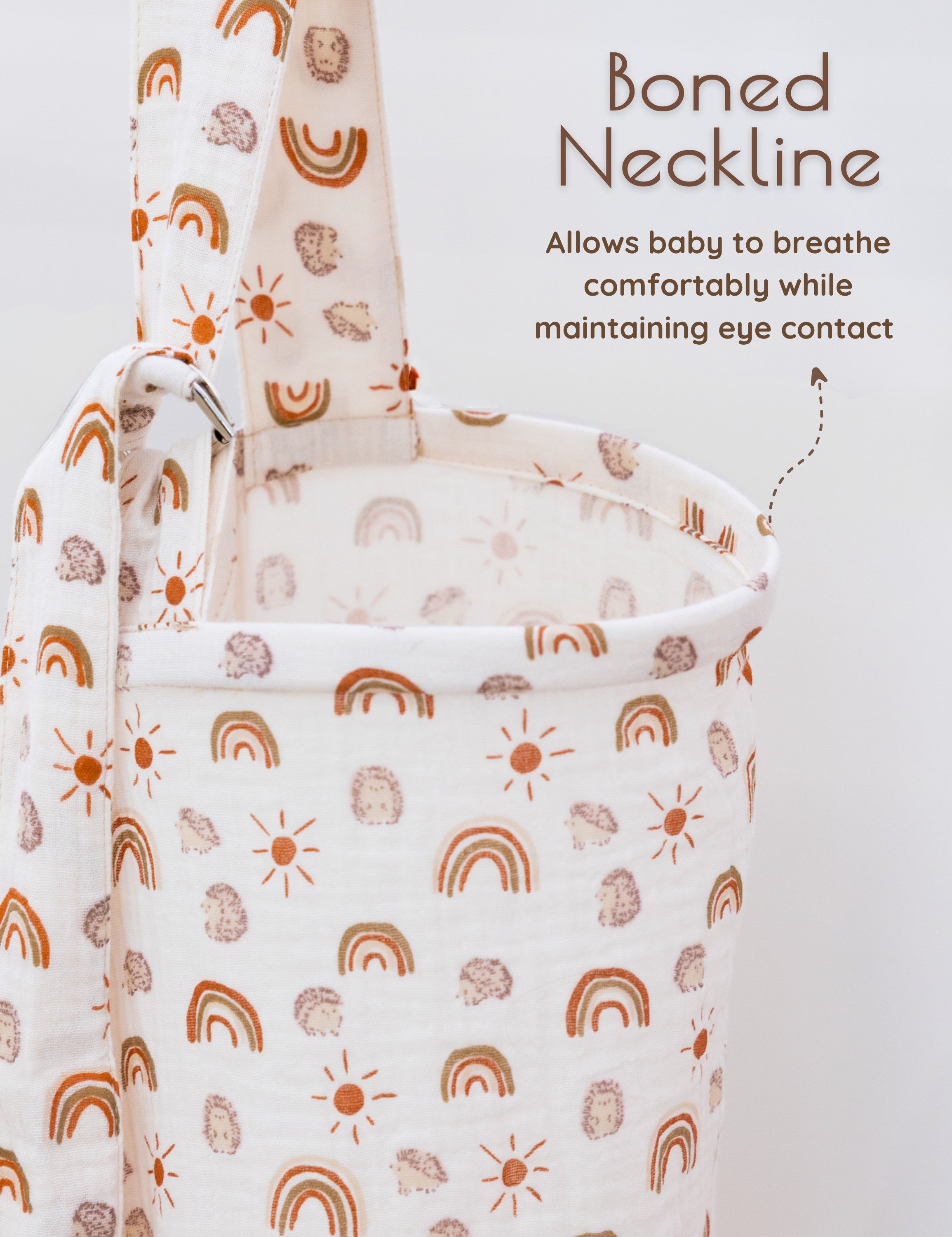 Muslin nursing cover with a boned neckline, designed to allow airflow and eye contact during breastfeeding.