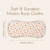 Rainbow patterned muslin burp cloth with measurements on a light background