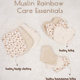 Baby care products including baby burp cloths, bibs and bandana bibs on a light background.