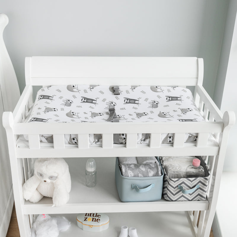 neutral nursery, sloth changing pad cover and storage bins